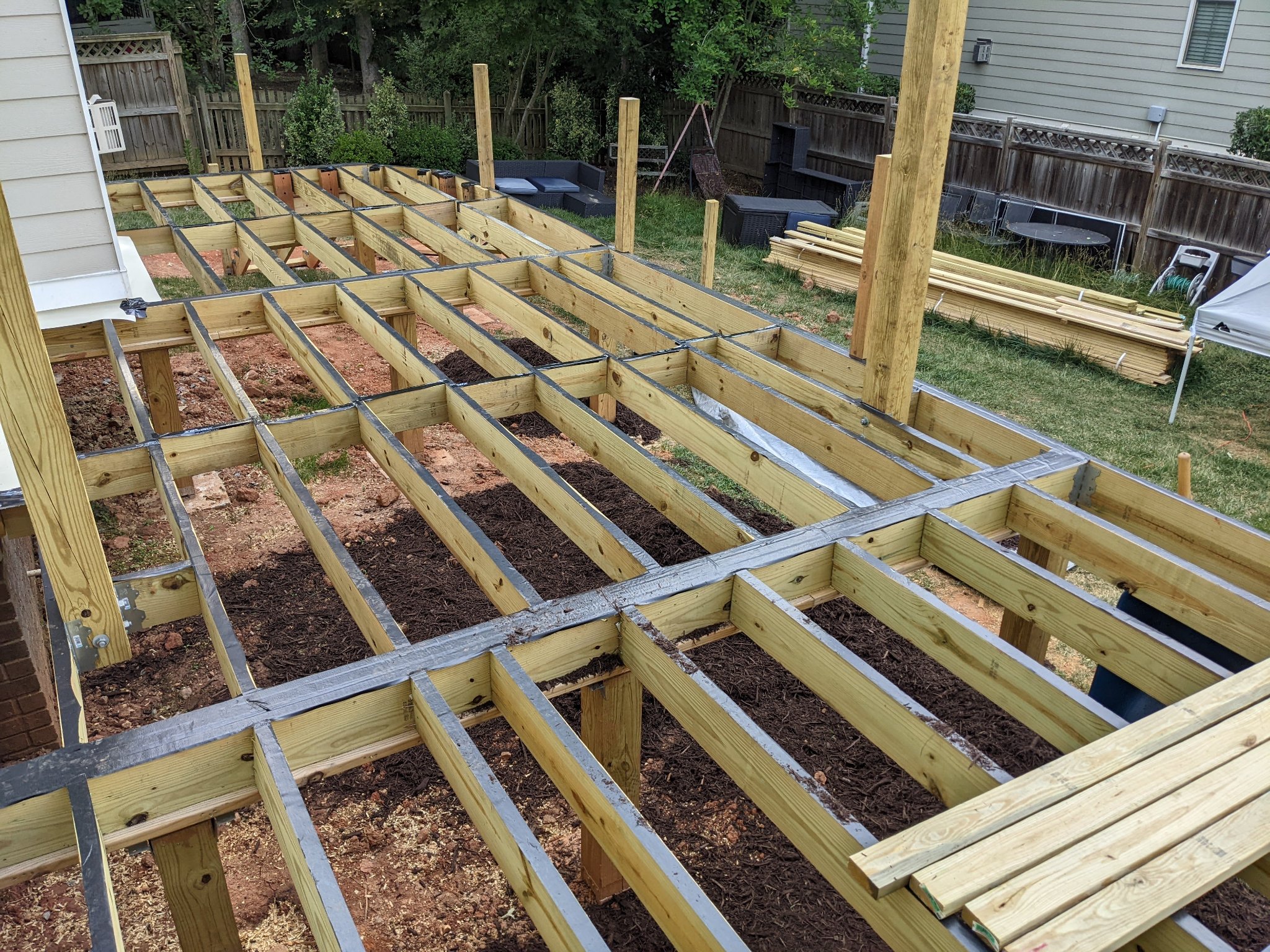 Stair framing and stringer assembly for large deck stair system in Raleigh NC